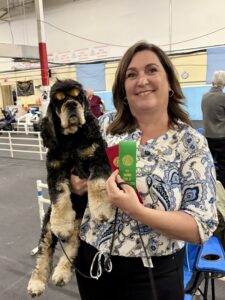 Jesselle Cocker Filo and his obedience ribbons
